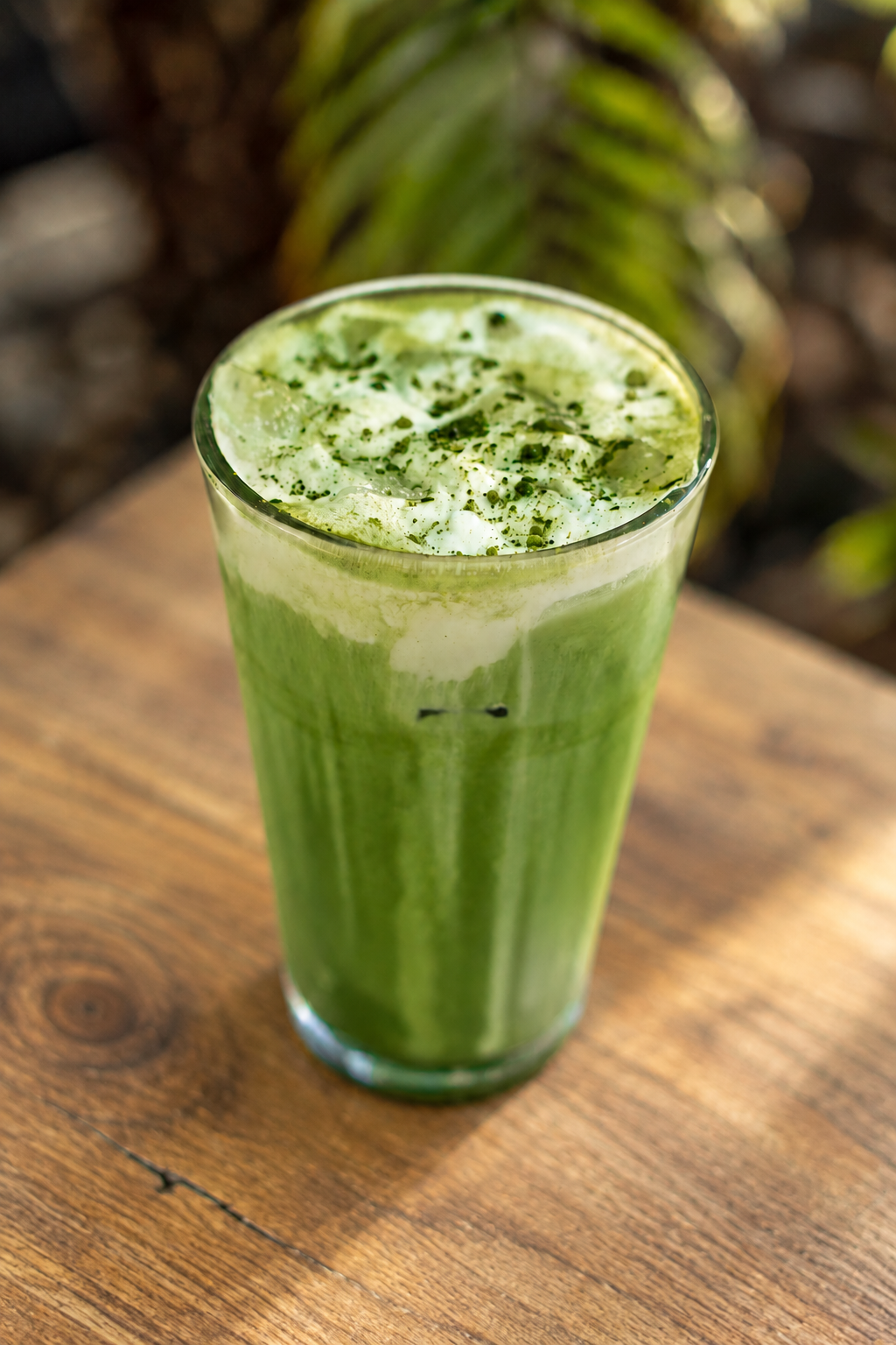 Iced Emerald Fog Latte topped with Earl Grey cold foam and a dusting of matcha.