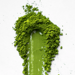 Omorie Emerald Ceremonial Matcha powder spread showing vivid emerald green color